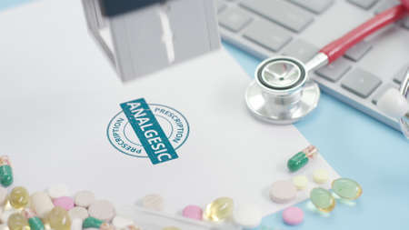 ANALGESIC PRESCRIPTION blue stamp on the paper, medicine related shot