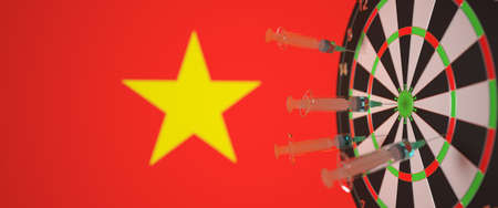 Syringes with a vaccine hit target near the Vietnamese flag. Successful medical research and vaccination in Vietnam. Conceptual 3D renderingの写真素材