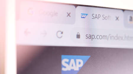 SAP SE domain name in browser and logo on the computer screen. Editorial macro shotのeditorial素材