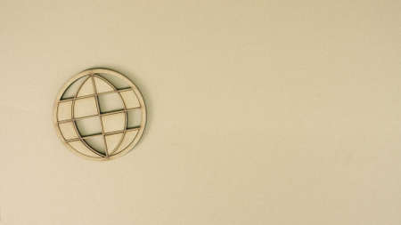 World or earth globe icon made of recycled cardboard on the table. Worldwide sustainability conceptの写真素材