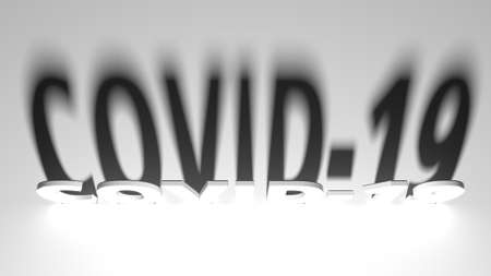 COVID-19 text with dramatic light and shadows 3d renderingの写真素材