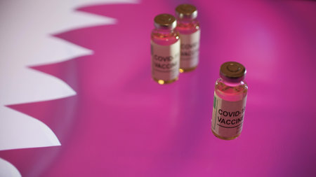 Vials with COVID-19 vaccine and flag of Qatarの写真素材