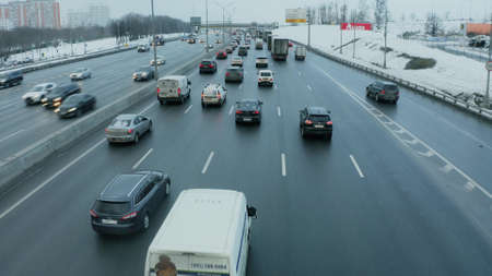 MOSCOW, RUSSIA - JANUARY 29, 2021. Low altitude FPV aerial view of the Moscow Ring Road traffic in...