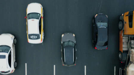 MOSCOW, RUSSIA - JANUARY 29, 2021. Low altitude aerial top down view of a busy city road traffic in winterのeditorial素材