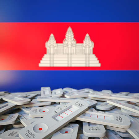COVID-19 rapid antigen tests and flag of Cambodia. Pandemic conceptual 3D renderingの写真素材