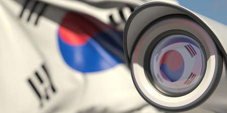 National flag of South Korea and CCTV camera. Surveillance system conceptual 3D renderingの写真素材