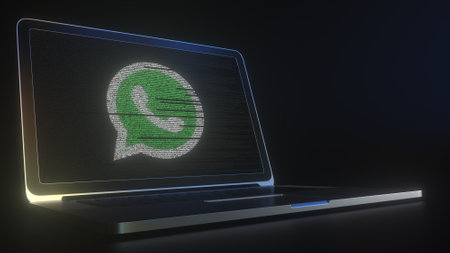 WHATSAPP logo made with computer code on the laptop screen. Editorial conceptual 3d renderingのeditorial素材