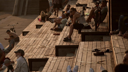 MOSCOW, RUSSIA - JULY 5, 2021. People violating COVID-19 coronavirus pandemic restrictions and marking on the park embankmentのeditorial素材