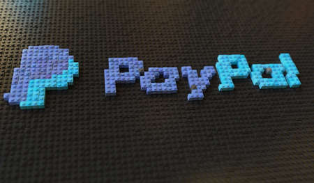 Plastic toy blocks compose logo of PAYPAL, editorial conceptual 3d renderingのeditorial素材