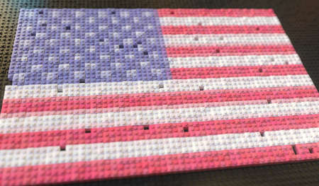 Plastic toy blocks compose flag of the USA, conceptual 3d renderingの写真素材