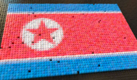 Plastic toy blocks compose flag of North Korea, conceptual 3d renderingの写真素材