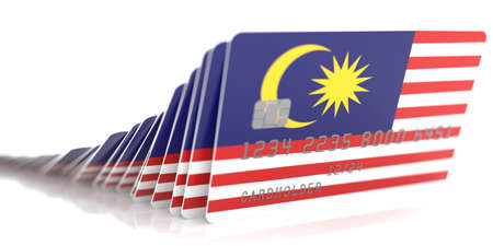 Line of fallen credit cards with flags of Malaysia on white background, 3d renderingの写真素材