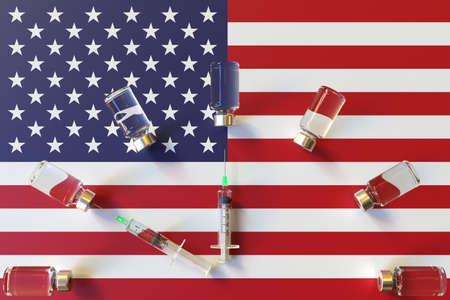 Flag of the United States and syrines with vaccine vials. Vaccination time concept 3D renderingの写真素材