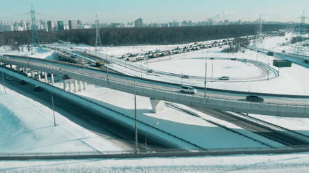Aerial view of a busy highway interchange in the snowの写真素材