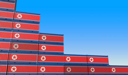 Flag of North Korea on containers forming declining trend of graph. National crisis or meltdown...