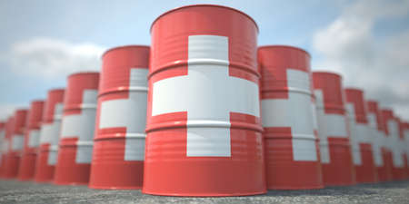 Flag of Switzerland on the barrels or steel drums. Chemical or oil industry related 3D renderingの写真素材