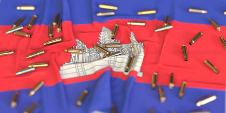 Flag of Cambodia and bullet shells. Crime or war related 3D rendering