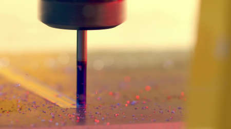 Metalworking CNC router bit in action, close-up shotの写真素材