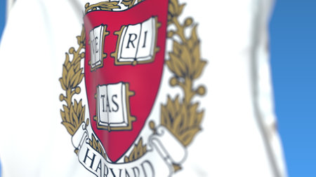 Flying flag with Harvard emblem, close-up. Editorial 3D rendering