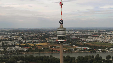 VIENNA, AUSTRIA - JULY 7, 2022. High altitude aerial shot of the Donauturm or Danube Towerのeditorial素材