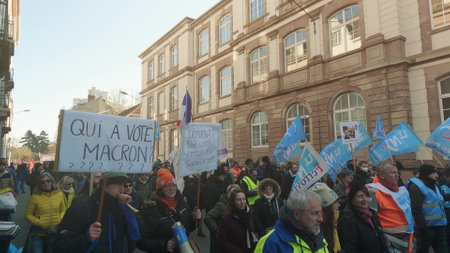MULHOUSE, FRANCE - FEBRUARY, 2023 French protesters walk down the streetのeditorial素材