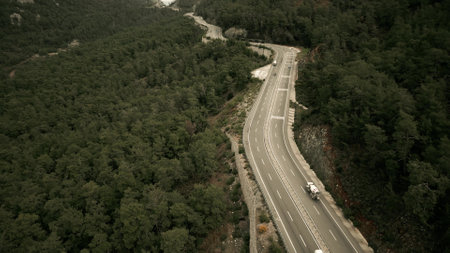 Aerial view of a modern highway traffic in the mountainsの写真素材
