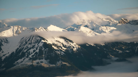 Curling clouds over beautiful Swiss Alps peaks near Lucerne. Switzerlandの写真素材