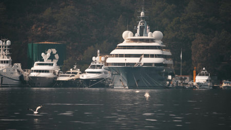 Moored motor yachts and a super yacht in Gocek, Turkeyの写真素材