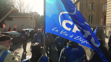 MULHOUSE, FRANCE - FEBRUARY, 2023 French Confederation of Christian Workers or CFTC protesters in the streetのeditorial素材