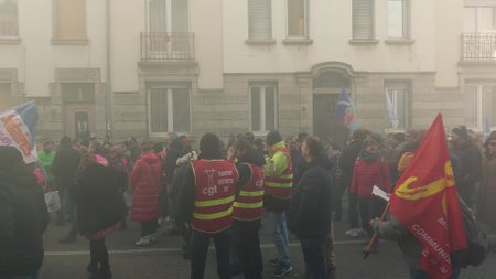 MULHOUSE, FRANCE - FEBRUARY, 2023 Protesters in smoke in the streetのeditorial素材