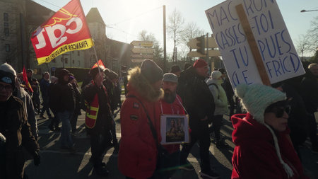 MULHOUSE, FRANCE - FEBRUARY, 2023 Street full of French protestersのeditorial素材