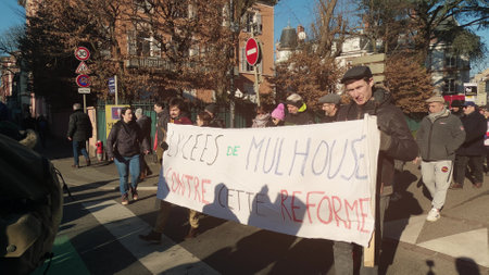 MULHOUSE, FRANCE - FEBRUARY 2023 Lyceum school protesters with the banner against the reformのeditorial素材