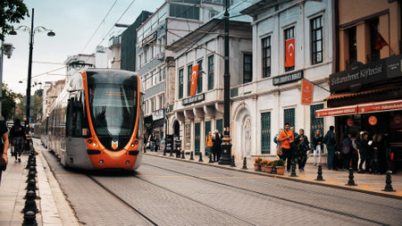 ISTANBUL, TURKEY - MAY 14, 2023. Modern urban tram on Divan Yolu Street in city centreのeditorial素材