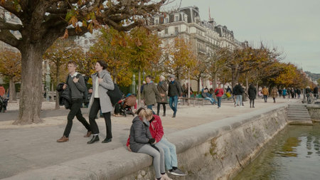 LUCERNE, SWITZERLAND - NOVEMBER 5, 2022. Crowded embankment in the cityのeditorial素材