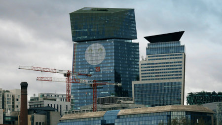 PARIS, FRANCE - APRIL 4, 2024. Skyscraper with the logos of Caisse dEpargne, Banque Populaire and the Paris 2024 Olympic and Paralympic Gamesのeditorial素材