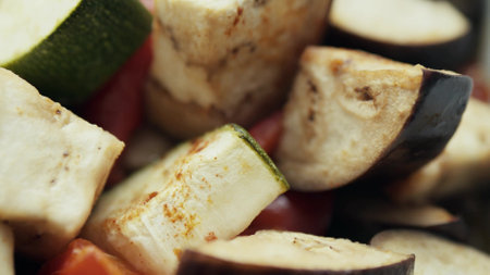 Baked cut vegetables, macro shot. Healthy eating conceptの写真素材