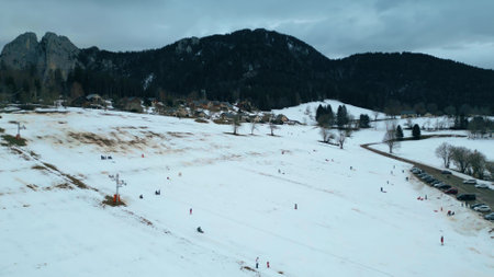 Aerial shot of the mountain skiing slope affected by lack of snow due to global warming in Saint-Nizier-du-Moucherotte, French Alpsの写真素材