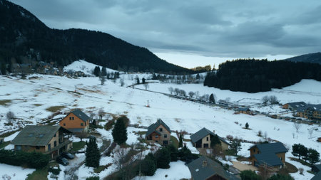 Aerial view of the alpine skiing slope affected by lack of snow due to global warming. Saint-Nizier-du-Moucherotte, Vercors, Franceの写真素材