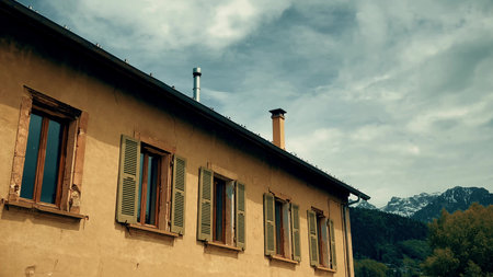 The windows with shutters of an old house in the French Alpsの写真素材