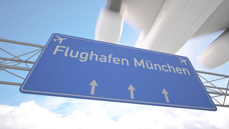Highway marker pointing to Munich Airport with aircraft heading for touchdown, arriving to Munich, Germany. 3D renderingの写真素材