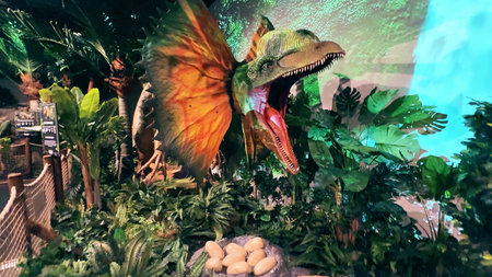 LYON, FRANCE - NOVEMBER 8, 2025. Moving dinosaur exhibit with animatronic displayのeditorial素材