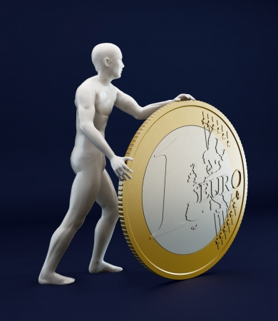Statue like man figure rolling a giant Euro coinの写真素材
