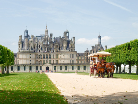 Chambord, France - June 7, 2014 ChÃ¢teau de Chambord  view of the castle and horse-drawn carriage with unknowed peoplesのeditorial素材