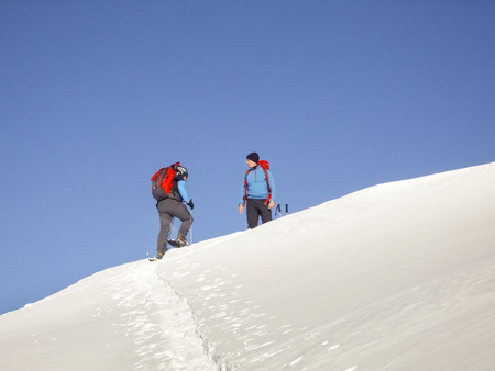 Cimadera Cima Fojorina, Switzerland - February 1, 2015: Walking people to mountain of Lombardy on the border between Italy and Switzerland.のeditorial素材