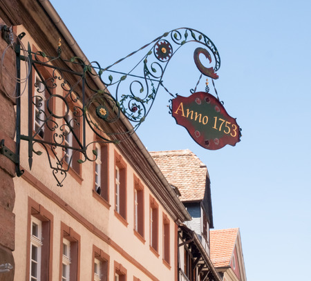 Neustadt an der Weinstrasse, Germany - April 19, 2015: Coat of Arms of professions exposed on the wall of the building. SI is a typical traditional finish of the Germanic countriesのeditorial素材