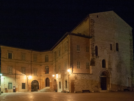 Italy, Gubbio - april 23, 2015: Evening pictures of the old town during a hot spring evening. The illuminations make partocolare the historic medieval villageのeditorial素材