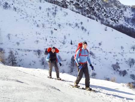 Cimadera Cima Fojorina, Switzerland - February 1, 2015: Walking people to mountain of Lombardy on the border between Italy and Switzerland.のeditorial素材