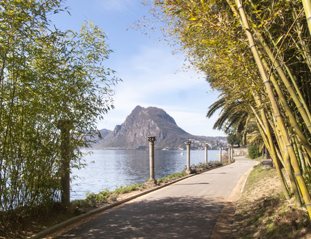 Lugano Castagnola, Switzerland - April 8, 2015: The museum park of cultures with ancient columns and the Gulf of Luganoのeditorial素材