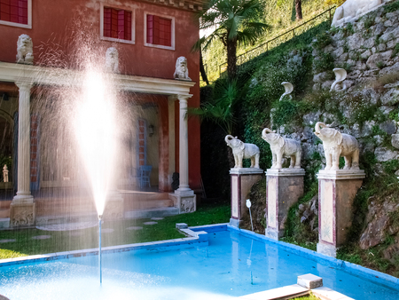 Morcote, Switzerland - Juli 9,2015: Scherrer Park. Called "The Garden of Wonders." houses a rich collection of art objects from different countries and different eras, surrounded by lush vegetation and buildings and works of art of various kinds from all のeditorial素材