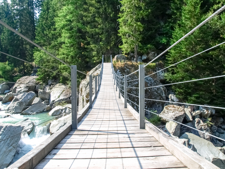 viamala, Switzerland: Tibetan bridge over the Rhine River between the gorges of the Valleyの写真素材